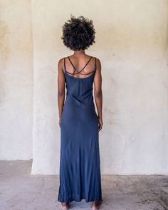 The IDIS Long slip dress is made from a light weight woven rayon. Designed with a scoop neck line and double strapes that drape nicely down the back, side splits to just below the knee and cut on the bias. These features create a dress that moves with you. Bringing you comfort and movability while maintaining a simple elegance. Our long slip looks great teamed with the Kimono Crop from the idis range for a layered effect. SIZE GUIDE XS: bust 76-82 cm | waist 64-70 cm | hips 78-84 cm S: bust 82-8 Vacation Slip Dress With Spaghetti Straps And Tie Back, Beach Maxi Dress With Bias Cut, Brunch Maxi Dress With Tie Back And Straight Neckline, Flowy Maxi Dress With Spaghetti Straps For Daywear, Fitted Summer Slip Dress With Tie Back, Summer Maxi Dress With Tie Back And Straight Neckline, Beach Midi Dress With Tie Back And Straight Neckline, Bias Cut Maxi Dress For Daywear, Beach Maxi Dress With Tie Back And Straight Neckline