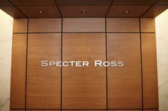 the specter ross logo is displayed on an elevator