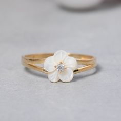 Flower Shaped Diamond Ring Gift, White Flower Shape Promise Ring, Dainty Flower Ring For Anniversary, White Flower Shaped Promise Ring, Anniversary Jewelry With 3d Flower Details, Dainty White Flower Ring, Dainty White Flower Promise Ring, Dainty White Flower Ring For Promise, Flower Shaped Ring For Wedding And Mother's Day