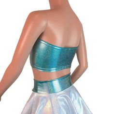 Stretch jade blue holograph mystique tube top. This tube top is sewn to fit your curves and not flatten you out, while fitting snug enough to stay up :) *FINAL SALE ITEM - Limited sizes Metallic Fitted Tube Top For Night Out, Blue Fitted Bandeau Crop Top, Fitted Blue Bandeau Crop Top, Blue Bandeau Tops For Night Out, Metallic Strapless Tube Top For Night Out, Blue Strapless Crop Top For Night Out, Strapless Blue Crop Top For Night Out, Blue Bandeau Tube Top For Party, Blue Bandeau Tube Top For Night Out