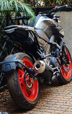 two motorcycles are parked next to each other