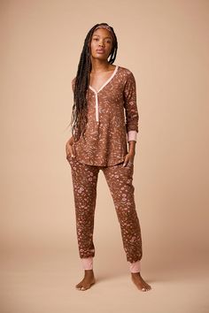 Welcome to the pajamas of your dreams. The Henley Harem set is the perfect pair of pajamas combining style and comfort to keep you looking and feeling great in bed and out. This set comes with a v-neck long sleeve style henley top, harem pants with tapered ankle cuffs, pockets, an adjustable drawstring waistband, and a matching headband. Made from our signature ultra-soft and moisture-wicking fabric blend. Made in Canada. Ultra-soft 93% Viscose from Bamboo / 7% Spandex. XS (0-2), S (0/2-4/6), M Cozy V-neck Sleepwear For Lounging, Floral Print Long Sleeve Loungewear Sleepwear, Long Sleeve Floral Print Loungewear Sleepwear, Long Sleeve Floral Print Sleepwear For Loungewear, Long Sleeve Floral Print Sleepwear, Floral Print Sleepwear Long Pants For Loungewear, Floral Print Loungewear Sets, Relaxed Fit Floral Print V-neck Sleepwear, Floral Print V-neck Sleepwear For Loungewear