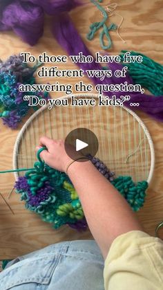 a person is knitting yarn on a wooden table with a quote about how to do it