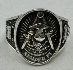 This offering is one sterling silver Masonic Marine Past Master Ring  (#BLJ PM-C01).  I like different so a put Tun Tavern on one side and Devil Dog on the other. Ring is finger size 12 but I can be sized up or down 2sizes. But this will delay shipping 2 to 3 days. Just send finger size the payment. Brother gave me permission to make a ring like it.   You are buying from a Brother Mason, purchase with confidence. This and all the items I sell are sold Satisfaction Guaranteed. If, for any reason, you are not, please let me be the first to know and it will be corrected immediately. Item can be returned for a full refund for any reason.  Shipping USPS Priority to all USA Locations. Adjustable Silver Rings For Commemoration, Classic Sterling Silver Rings For Commemoration, Silver Engraved Ring Stamped 925 For Commemoration, Commemorative Sterling Silver Rings, Classic Silver Rings For Commemoration, Silver Hallmarked Rings For Commemoration, Adjustable Silver 14k Stamped Signet Ring, Adjustable Silver Signet Ring Stamped 14k, Mason Ring