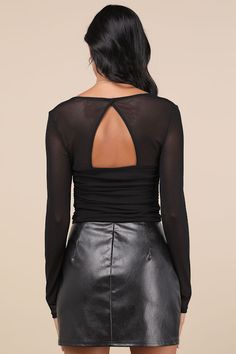 Your date will be in awe of you all night long when you're wearing the Lulus Coy Cutie Black Mesh Bustier Long Sleeve Crop Top! This sultry mesh top starts with a bustier-inspired bodice with padded cups and supportive underwire, a flirty sweetheart neckline (with hidden no-slip strips), and sheer long sleeves. The fitted silhouette features flattering ruching along the sides and an eye-catching cutout at the back, before finishing at a cropped hem. Fit: This garment fits true to size. Length: Size medium measures 18" from shoulder to hem. Bust: Great for any cup size. Waist: Fitted - stretchy fabric allows custom fit. Undergarments: Padded cups - May be worn with an adhesive bra, petals, or no bra. Fabric: Fabric is very stretchy. Bodice is lined. Shell: 95% Nylon, 5% Spandex. Lining: 100 Fitted Long Sleeve Chic Mesh Top, Chic Fitted Long Sleeve Mesh Top, Chic Fitted Long-sleeve Mesh Top, Night Out Mesh Top With Built-in Bra, Mesh Top With Built-in Bra For Night Out, Stretch Top With Built-in Bra For Date Night, Chic Sheer Crop Top For Party, Chic Mesh Top With Built-in Bra, Mesh Crop Top With Mesh Sleeves For Night Out