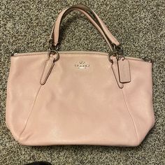 Light Pink Coach Purse. This Was Given To Me As A Gift And I Have Never Used It. It Does Look Like It Has Some Minor Stains On The Inside (Probably From The Family Member Who Gifted It To Me), Besides That It Is In Excellent Condition. Pink Coach Tote, Coach Pink Purse, Coach Pink Tote Bag, Pink Coach Purse, Pink Coach Purses, Pink Coach Shoulder Bag With Gold-tone Hardware, Pink Coach Bag With Zipper Closure, Light Pink Color, Bags Coach