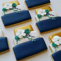 blue and white decorated cookies on a table