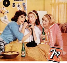 an advertisement for 7up beer with three women sitting at a table and one woman standing in front of her