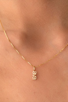 Show off what makes you, well, you with our Petite Nameplate Pendant. Transform any name or word into the sweetest statement piece you'll ever lay eyes on. Handmade with love in sunny Los Angeles from solid 14k gold, it's your personalized touch of charm and sparkle! Equipped with a 4mm jump ring to fit most chains. Wear it solo, stack them up, or mix and match with your favorite charms. Nameplate Ring, Healing Hearts, Healing Heart, Handmade With Love, Name Plate, Jump Rings, Statement Pieces, With Love, Charms