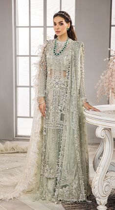 Emerald Green Lehenga Shirt Pakistani Wedding Party Wear is a gracefully embellished piece that gives you a magnificent appearance at your wedding. Fast Shipping Party Wear Sharara With Dabka For Reception, Elegant Sets With Dabka Detail For Reception, Elegant Sets With Dabka For Reception, Elegant Dabka Sets For Reception, Sets With Resham Embroidery For Wedding And Eid, Resham Embroidered Sets For Wedding And Eid, Eid Wedding Sets With Resham Embroidery, Organza Sharara For Wedding And Eid Festivities, Wedding Sets With Dabka Work For Eid