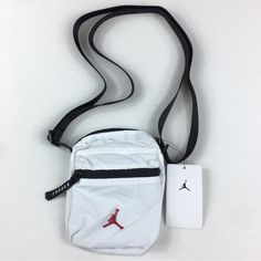 Brand New With Tags Jordan Jumpman Waist Bag Fanny Pack Belt Festival Pouch Crossbody White New White Zipper Pouch For Travel, White Pouch Shoulder Bag With Zipper Closure, White Zipper Travel Pouch, White Shoulder Bag Pouch With Cell Phone Pocket, White Crossbody Travel Bag, White Pouch Bag With Zipper Closure, White Pouch Shoulder Bag For Everyday Use, White Sporty Crossbody Bag, White Pouch For Everyday Use