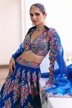 Blue lehenga with zardosi and pearl embroidery in paisley floral pattern. Paired with an embroidered blouse and cutwork embroidered dupatta. - Aza Fashions Designer Blue Lehenga With Motifs, Blue Motif Choli For Reception, Blue Motifs Choli For Reception, Fitted Blue Lehenga With Motifs, Bollywood Style Blue Sharara With Motifs, Blue Wedding Dress With Motifs, Blue Choli With Motifs For Eid, Elegant Blue Lehenga With Motifs, Semi-stitched Blue Lehenga With Motifs