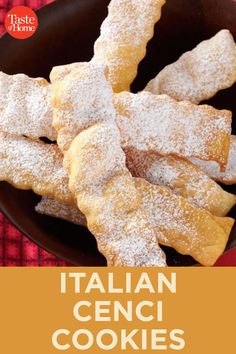 italian cenci cookies with powdered sugar in a black bowl on a red and white checkered tablecloth