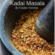 a bowl full of food with the words kadai masala written in front of it