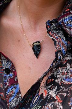 "This Obsidian arrowhead necklace has the most beautiful angles. Aside from the perfect everyday necklace that will go with anything, this beauty is your reminder that you are limitless. Would look so amazing with our Herkimer gold choker. The arrowhead is a powerful symbol known throughout history. Wearing an arrowhead around your neck is a symbol of protection & strength. It's also an icon of courage, protecting its wearer from negative energy. ▲ Obsidian arrowhead pendant ▲ 14k gold fill cabl Handmade Black Arrowhead Necklace, Bohemian Arrowhead Jewelry As A Gift, Bohemian Arrowhead Jewelry As Gift, Bohemian Arrowhead Jewelry Gift, Arrowhead Wire Wrapped Necklaces For Gifts, Wire Wrapped Arrowhead Necklace For Gift, Handmade Spiritual Arrowhead Necklace, Spiritual Arrowhead Necklace Gift, Adjustable Arrowhead Necklace Gift