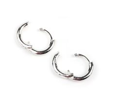 These tiny hoops are our new favorite, wear-on-repeat earrings. So comfortable, they can even be worn to bed. Hypoallergenic, featuring a click and go, backless clasp, these minis are perfect for your primary earring holes or as part of your secondary ear-styling. Product details - Sterling silver dipped with a .35" diameter- Hypoallergenic; 925 sterling silver posts Shipping Free US ground shipping on all orders $50 and over. We also provide International shipping and 2-day domestic shipping. R Adjustable Clip-on Small Hoop Earrings, Adjustable Small Hoop Clip-on Earrings, Casual Adjustable Small Hoop Earrings, Trendy Nickel-free Small Hoop Cartilage Earrings, Adjustable Small Hoop Cartilage Earrings, Golf Necklace, Golf Jewelry, Ear Styling, Earring Hole