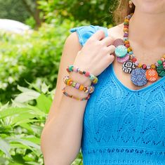 Unique wheel-shaped Kantha beads alternate with round beads to create this unique stretchy strand. It easily rolls on and off and makes a subtle statement! Crafted from repurposed Kantha textiles, the colors and patterns will vary slightly. Sustainably handmade by women artisans in India. Keychain Clip, Earring Box, Grad Gifts, Cotton Scarf, Fashion Hair Accessories, Elastic Bracelet, Flower Bracelet, Women Artisans, Metal Earrings