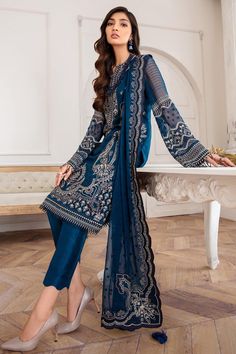 Teal Blue Heavily Embroidered Pakistani Salwar Kameez Party Wear is a perfectly stitched masterpiece that has the perfect balance of royalty and grace. The Kameez Salwar comes in an alluring pearl white shade that will steal everyone's hearts at the very first glance with its charm and elegance. Embroidered Kameez: The Pakistani Salwar Kameez has an alluring white shade and it comes in a premium tissue fabric. Hand-crafted details of pearls and motifs enhance the glamour of this embellished kame Pakistani Design, Desi Outfits, Pakistani Salwar, Salwar Kamiz, Pakistani Salwar Kameez, Embroidered Chiffon, Elegant Embroidery, Punjabi Suit, Salwar Kameez Designs