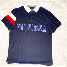 Nwt Tommy Hilfiger Thompson Polo Shirt Has Short Sleeves. Approximate Measurements: Pit To Pit: 21” Sleeve Length: 9” Ba84po106rn4r21 Blue Collared Sporty Tops, Navy Fitted Polo Shirt For Spring, Blue Collared Tommy Hilfiger Shirt, Tommy Hilfiger Blue Collared Shirt, Fitted Blue Tommy Hilfiger Shirt, Tommy Hilfiger Navy Sporty Tops, Tommy Hilfiger Navy Short Sleeve Top, Tommy Hilfiger Blue Short Sleeve Shirt, Fitted Tommy Hilfiger Casual Polo Shirt