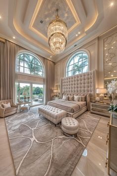 a luxurious bedroom with large windows and chandelier