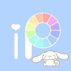 a rabbit sitting in front of a color wheel