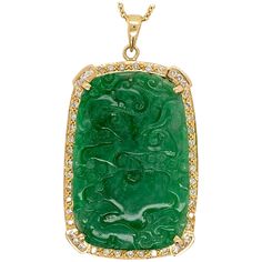 Rare GIA Certified Estate Natural Diamond and Jade 18k Yellow Gold Pendant measuring 43.01x28.25x4.44mm. The Pendant is set with a Natural Translucent Jadeite Jade Green Carving with Natural Color, no indications of impregnation. The total weight of the piece is 24.33 grams. The Carving is mounted in a 18K Gold Pendant set with 49 Natural Round Brilliant Diamonds weighing approximately 1ct. The diamonds are approximately G in color and VS in clarity. Luxury Green Carved Jewelry, Luxury Carved Round Jewelry, Luxury Jade Pendant Necklace, Luxury Gold Jade Jewelry, Luxury Jade Pendant Necklaces, Luxury Carved Jade Jewelry, Luxury Oval Pendant Jade Necklace, Luxury Hallmarked Jade Jewelry, Luxury Jade Necklace With Oval Pendant