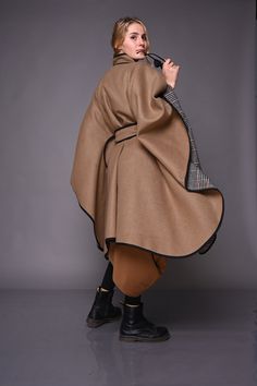 Winter Wool Coat, Winter Cape Coat, Wool Poncho Coat 🤎Introducing our stunning beige cape coat. It has an incredible and elegant design that makes an impression. With it you will always feel special and unique.  👒It is for your need for personal style and beauty. The cape is made of high-quality wool fabric, which has two sides. The fabric is 100% Italian imported wool. On the side of the cape there are two round openings that frame the figure. So it closes with a belt and 3 hidden buttons on Oversized Beige Cape Outerwear, Beige Cape For Winter Workwear, Brown Winter Cape, Beige Wool Cape Outerwear, Brown Cape Outerwear For Work, Brown Cape For Workwear, Beige Wool Cape For Fall, Beige Winter Cape Poncho, Winter Cape Coat