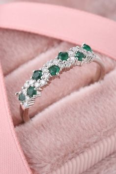 Emerald gemstone is never out of fashion. Shop this pear cut emerald ring. #emeraldring #engagementring #rings #stylishring #vintagering Green Cluster Diamond Ring For Wedding, Green Cluster Ring For Weddings, Green Cluster Diamond Wedding Ring, Emerald Cluster Ring For Wedding, Emerald Cluster Ring With Diamond Accents For Wedding, Green Cluster Ring With Diamond Accents For Wedding, Cluster Green Emerald Ring For Wedding, Green Diamond Half Eternity Ring For Anniversary, Emerald Cluster Diamond Ring For Wedding