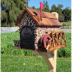 a mailbox made out of wood and stone