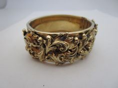 "7\" inside circumference.  Nice condition.  Quality made.  Security chain." Luxury Formal Filigree Cuff Bracelet, Ornate Gold Cuff Bracelet With Filigree, Luxury Victorian Gold Cuff Bracelet, Ornate Gold Filigree Cuff Bracelet, Luxury Vintage Filigree Cuff Bracelet, Vintage Cuff Bracelet, Wide Cuff Bracelets, Turquoise Ring Silver, Purple Rhinestone