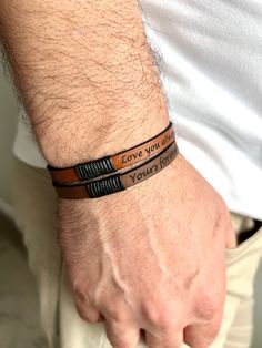 The custom leather wristband bracelet is a perfect men's gift that can be personalized with a unique message, making it an ideal gift for a dad, boyfriend, or husband, or for any occasion like a birthday, Father's Day, or a special leather gift.  Its unique design and high-quality leather material. Text is your choice. It can be words or names you like. Please check the features you have selected to make sure before ordering. If you take off your wristband while bathing or swimming, you can use Mens Bracelet Personalized, Leather Wristbands, Wristband Bracelet, Personalized Gifts For Dad, Men's Bracelet, Boyfriend Birthday, Leather Gifts, Gift For Dad, Custom Leather