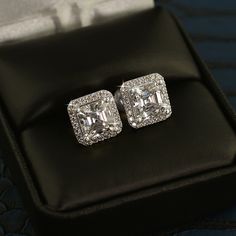 Own the room with these stunning GRA certified VVS1 clarity halo earrings. These shine with incredible intensity in person, with a stunning 0.60 carat or 2.00 carat center stone surrounded by a ring of smaller brilliant cut round stones for extra fire and brilliance. Moissanite is scientifically proven to reflect light more (higher light refraction rate) than any CZ or replica diamond, as well as most common quality natural diamonds. They are hand set and finished with quality screw-backs, just Martini Set, Light Refraction, Expensive Diamond, Halo Diamond Earrings, Halo Stud Earrings, Halo Earrings, Halo Earrings Studs, Solitaire Studs, Moissanite Earrings