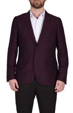 Add a professional edge to your look in this classic slim fit blazer.Fit: this style fits true to size. . Slim fit. Peak lapel. Long sleeves with 4 non-functional buttons. Front button closure. Chest welt pocket; front flap pockets. Interior pockets. Side vents. Burgundy fabric construction. Partially lined. Approx. 30" length . Imported Dry clean 80% Polyester, 18% Rayon, 2% Spandex Classic Burgundy Suits For Business Casual, Burgundy Notch Lapel Suit For Business Casual, Elegant Burgundy Suit For Business Casual, Elegant Burgundy Business Casual Suit, Burgundy Suits For Formal Fall Occasions, Formal Burgundy Blazer With Lapel Collar, Purple Lapel Collar Blazer For Office, Elegant Burgundy Blazer For Business, Burgundy Blazer With Suit Collar For Work