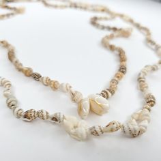 2 Long Puka Conch Cowrie Shell Necklace Ivory Brown Boho Beach Cruise Hawaii 34" Adjustable Cream Jewelry For Vacation, Adjustable Single Strand Necklace For Vacation, Bohemian Beige Jewelry For Vacation, Adjustable Cream Shell Necklace Gift, Natural Beaded Necklaces For The Beach, Cream Beaded Necklaces For Beach, Handmade Beige Jewelry For Vacation, Adjustable Beige Beaded Necklaces For Beach, Cream Shell Necklace For Beach