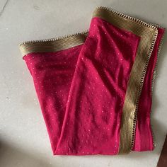 Hot pink bridal Indian dupatta Can be made in any color. More dupatta here in our collection https://www.etsy.com/shop/neelcreations/?section_id=15880219 Georgette mukaish work Indian dupatta. It has beautiful golden border. These designer dupattas are very much in trend. Pair them with plain salwar kameez or brocade kurta. NOTE : There might be slight color variation due to different colour settings. Red Indian Wedding, Brocade Kurta, Indian Dupatta, Mukaish Work, Bridal Indian, Pink Dupatta, Indian Skirt, Bridal Dupatta, Golden Border