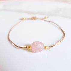 Rose Quartz Jewelry Adjustable Dainty Bracelet Beige Nylon Cord Water-Friendly Pair multiple styles together for stacked look! Rose Quartz Properties: Love, Compassion, Peace, Friendship Trendy Adjustable Pink Gold Jewelry, Adjustable Pink Resizable Braided Bracelets, Adjustable Resizable Pink Braided Bracelets, Adjustable Rose Quartz Beaded Bracelets, Pink Beaded Bracelets With Adjustable Cord As Gift, Pink Adjustable Beaded Bracelets For Gifts, Trendy Pink Jewelry With Adjustable Cord, Pink Braided Bracelet With Adjustable Cord As Gift, Trendy Pink Braided Bracelet With Adjustable Cord