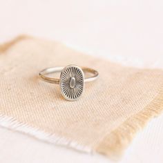 A kiss from the sun.  Full of life and warmth. This sweet stamped silver ring is perfect alone or stacked with other rings.  Sterling silver.  Please select your ring size during checkout. Your jewelry will arrive beautifully gift wrapped in a small box. Multiple items will be combined, unless separate boxes are reques Silver Dainty Stamped Ring, Sterling Silver Sun Design Ring For Gift, Dainty Stamped Silver Rings, Sterling Silver Ring With Sun Design For Gift, Spiritual Silver Stackable Rings For Everyday, Silver Spiritual Stackable Rings For Everyday, Sterling Silver Sun Design Ring, Sterling Silver Ring With Sun Design, Silver Sterling Sun Design Ring