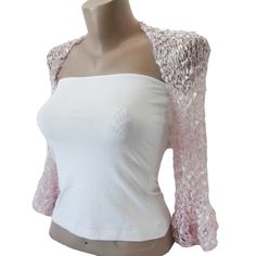 This Pale Pink Ruffle Sleeves Bolero is a perfect accessory for your summer outfit. It gives an elegant silky touch and is proper for the late spring and the summer months. Be the star at the dancing with this lightweight loose shrug. It matches perfectly with an evening dress as well over a party top.   This bolero is quite stretchy. Ask for a Custom order to fit exactly your size ot choose it according to the measures given below. It is available in Plus size also. Please contact us to send us Spring Party Crochet Top, Long Sleeve Summer Shrug For Party, Feminine Crochet Top For Spring Party, Summer Party Shrug With Stretch, Elegant Stretch Crochet Top For Party, Spring Party Lace Shrug, White Party Shrug For Spring, Stretch Summer Party Shrug, Elegant Crochet Top For Wedding