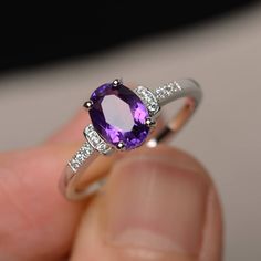 This is a gorgeous handmade creation. Its beauty is its simplicity & Elegance. The 6*8mm oval cut natural amethyst is crafted in solid sterling silver and with rhodium plated. It is available to customized, if you have any mind, just let me know, we will discuss with it. All item is sent in a beautiful gift box You can realize more lovely stuff clicking the link https://www.etsy.com/shop/knightjewelry?refshopsection_shophome_leftnav Please leave the correct address and you PHONE NUMBER for d February Birthstone Ring, Ring Purple, Brown Gemstone, Purple Amethyst Ring, Wedding Rings Unique, February Birthstone, Amethyst Purple, Ring Oval, Pink Gemstones