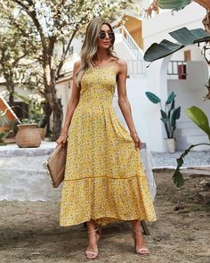 The Emes Shop dress is detailed with a dainty floral print. Features a straight neck line. sleeveless. flowy skirt. and above ankle length. Pair it with sandals and sunnies for a classy summer look.MATERIALS: 90% Soft viscose. 10% blended cottonMEASUREMENTS: Product length is 45"-47" in 4-6-Small | Waist: 25-26.5 in | Chest: 33-34.5 in | Hips: 35-36.5 in 6-8-Medium | Waist: 26.5-28 in | Chest: 34.5-36 in | Hips: 36.5-38 in 8-10-Large | Waist: 28-29.5 in | Chest: 36-37.5 in | Hips: 38-39.5 in 10-12-X-Large | Waist: 29.5-31 in | Chest: 37.5-39 in | Hips: 39.5-41 in MEASUREMENTS: Product length is 114-119 cm 4-6-Small | Waist: 63-66 cm | Chest: 83-86 cm | Hips: 88-91 cm 6-8-Medium | Waist: 67-71 cm | Chest: 87-91 cm | Hips: 92-96 cm 8-10-Large | Waist: 71-75 cm | Chest: 91-95 cm | Hips: 96-10 Beach Floral Dress, Floral Maxi Dresses, Bohemian Beach Dress, Print Summer Dress, Floral Print Dress Summer, Beach Floral, Boho Beach Dress, Shop Dress, Ruffles Fashion