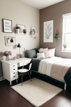 a bedroom with a bed, desk and pictures on the wall