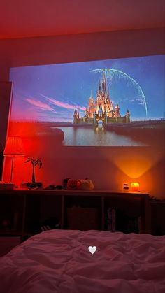 a large projection screen in a bedroom