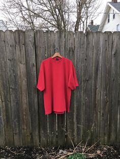 This is an awesome short sleeve thermal style shirt that is waiting to go on some adventures. If you want to look and feel great, get it in your life now. It is in great condition and has no rips, holes, stains or smells. Measurements: Pit to pit: 25 3/4 inches Collar to bottom front: 26 1/2 inches Collar to bottom back: 30 inches Size on tag: 2 XL Oversized Short Sleeve Tops For Outdoor, Vintage Short Sleeve T-shirt, Red Short Sleeve T-shirt For Outdoor, Red Short Sleeve T-shirt For Outdoors, Red Short Sleeve Tops For Outdoor, Red Cotton Tops For Outdoor, Red Oversized Short Sleeve T-shirt, Thermal Shirt, Vintage Vans