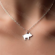 Available in multiple sizes and metal options ✨ Chain not included ❌ Gift packaging included 💕 🐷 Elevate your style with our minimalist Pig Charm Pendant! 🌟 🌿 Crafted with sleek lines and understated elegance, this charming pendant captures the playful spirit of pigs. Whether you're a pig enthusiast or simply appreciate farm animals, this pendant is a delightful addition to any collection. 💍 🎁 Treat yourself or surprise a fellow pig lover with this adorable pig charm. Shop now and let your style shine with simplicity. ✨ Animal Pendant, Pig Lovers, Understated Elegance, Farm Animal, Charm Gift, Pigs, Gift Packaging, Farm Animals, Charm Pendant