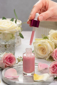 Learn how to make a rose serum for face and glowing skin at home. The DIY face serum is best for sensitive skin, anti aging, and dry skin care. Formulated with natural ingredients, rose hip oil and essential oils, the moisturizing serum can restore suppleness, collagen, and the skin barrier. The comprehensive beauty product recipe shares the benefits and tips for applying and formulating homemade facial serums. CountryHillCottage.com
 ... less Skin Serum Diy, Facial Serum Recipe, Serum For Sensitive Skin, Rose Serum, Essential Oil Anti Aging, Diy Serum, Diy Rose, Diy Skin Care Recipes