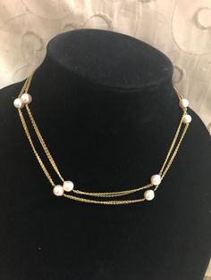 Vintage Solid 14K Yellow Gold 33" Double Strung Pearl  Curb Chain Necklace in wonderful estate condition, without any noticeable wear. Beautiful necklace crafted in solid gold and white A Quality natural pearls.  Excellent choice for casual or dress up. I love the versatility of this one as you can wear long with a sweater or something that is not low cut or doubled up, perfect for that shorter little black dress! See our photos and certified GSA written appraisal for further details.. ( marked Formal Yellow Gold Chain Necklace With Pearl Charm, Classic Yellow Gold Pearl Chain Necklace, Formal Yellow Gold Pearl Necklace With Chain, Classic Gold Pearl Necklace With Chain, Gold Double Strand Pearl Necklace For Formal Occasions, White Pearl Necklace With Double Chain, Formal Gold Double Strand Pearl Necklace, Classic White Chain Necklace For Anniversary, Curb Chain Necklace