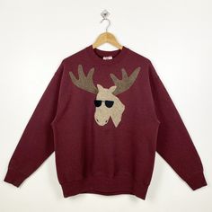 90s Art White-Tailed Deer Crewneck Sweatshirt Embroidery Logo Red Color Men's L - Made in Usa - Materials : Cotton, Polyester  - Tag Reads : L Kindly see the actual measurements (All measurements were taken lying flat) - Actual size manual measurements * Width (Armpit to armpit) : 23 inches * Length (Shoulder to end of garment) : 27.5 inches * Sleeve length : 23 inches - Condition : * Vintage condition 8/10 (80%) * Minor stain refer picture * Free from tear and major defect - Shipping : * DHL Ex Red Embroidered Tops For Fall, 90s Style Winter Tops With Embroidered Logo, Retro Tops With Embroidered Graphics For Winter, Vintage Embroidered Sweater For Fall, Red Embroidered Sweatshirt For Fall, 90s Style Winter Sweatshirt With Embroidered Graphics, 90s Embroidered Sweatshirt For Fall, Red Sweatshirt With Embroidered Graphics For Streetwear, Vintage Embroidered Sweater For Streetwear