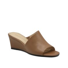 Adrienne Vittadini-Adami Wedge Sandal Bring some classic touches to your summery look with the sleek Adrienne Vittadini Adami sandal. This wedge pair sports a slide silhouette for easy wear. Classic Slip-on Heels For Summer, Classic Synthetic Slides, Summer Slip-on Mules With Wedge Heel, Classic Summer Slides With Cushioned Footbed, Modern Brown Wedge Sandals For Spring, Summer Wedge Sandals With Ortholite Insole, Classic Sandals With Ortholite Insole, Casual Brown Slide Wedge Sandals, Modern Brown Wedge Sandals