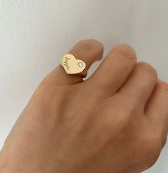 This beautiful signet ring features a heart with a single stone and engraving of your choice. 14K Yellow, White or Rose Gold Script engraving 8mm or 10mm heart FINAL SALE 14k Gold Heart Ring With Single Diamond For Gift, Classic Heart-shaped Signet Ring For Promise, Classic Heart Shaped Signet Promise Ring, Classic Heart-shaped Signet Promise Ring, Heart-shaped Single Diamond Gift Ring, Heart-shaped Single Diamond Ring Gift, Heart Shaped Single Diamond Gift Ring, Heart Shaped Single Diamond Ring For Gift, Gold Heart Ring With Single Diamond As Gift