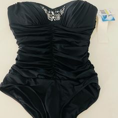 Brand New With Tags Black Beaded One Piece Swimsuit. Runs Small , Fits Like Xxs-Xs Elegant Fitted Swimwear For Evening, Elegant One-piece Bodysuit For Evening, Elegant Evening One-piece Bodysuit, Elegant Black Bodysuit For Pool, Elegant Stretch Embellished Bodysuit, Elegant Embellished Fitted Bodysuit, Elegant Embellished Stretch Bodysuit, Glamorous Embellished Fitted Swimwear, Embellished Fitted Party Swimwear